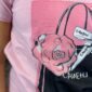 Großhandel Rosa Boutique Shirt mit Fashion Print und Strassteinen vorne