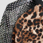Braunes Leoparden Zweiteiler Großhandel, Oversize T-Shirt mit Tiger Strassmotiv und Netzärmeln, passende Shorts im klassischen Leopardenprint, rosemodee.de