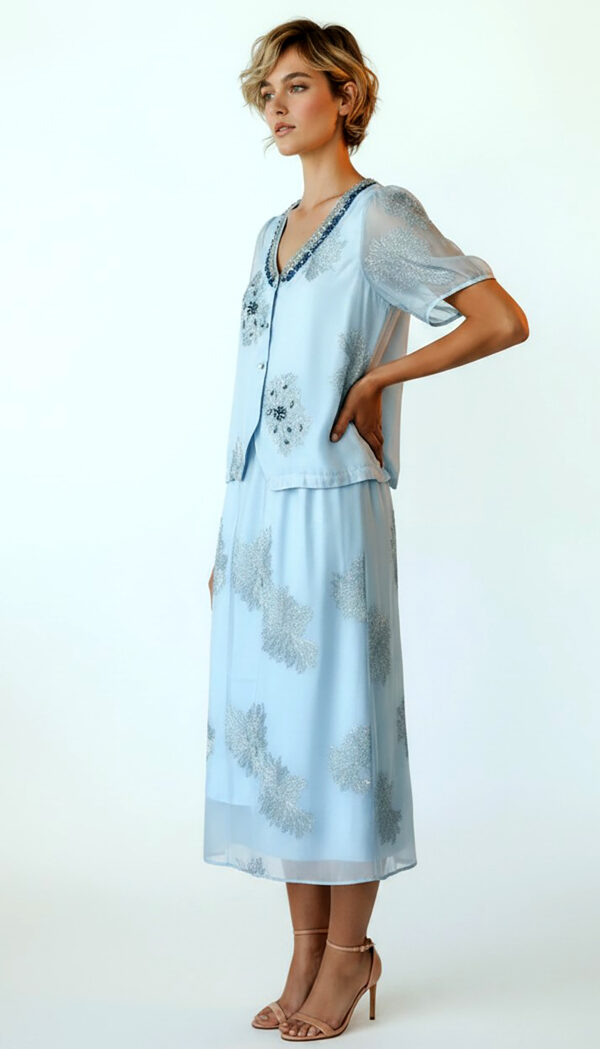 Hellblaues Oversize Damen Blusen Rock Set mit Strass Großhandel (9) Hellblaues Oversize Damen Blusen Rock Set mit Strass und transparenten Ärmeln